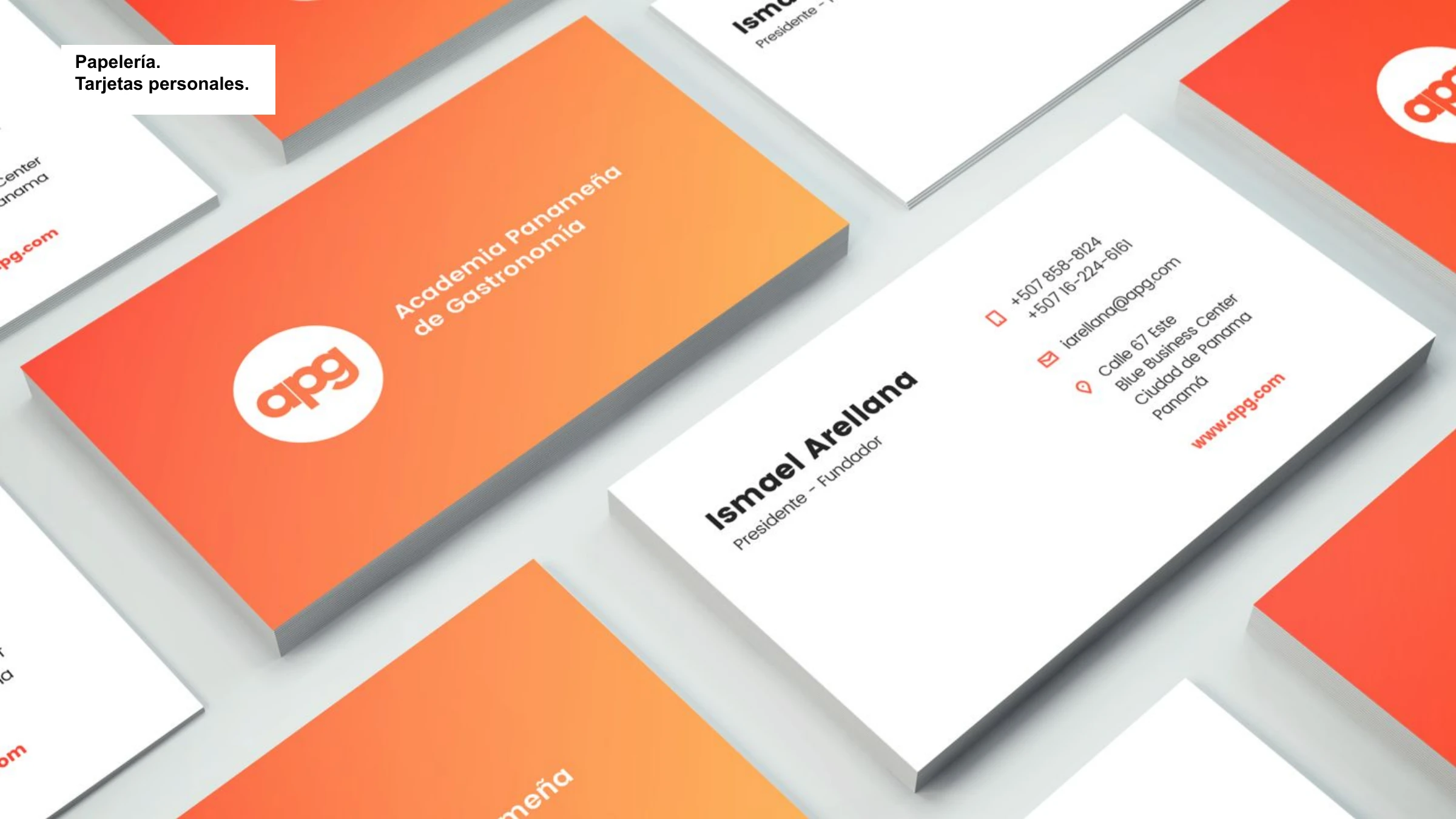 APG business cards — warm-gradient front with the logo, white back with contact details
