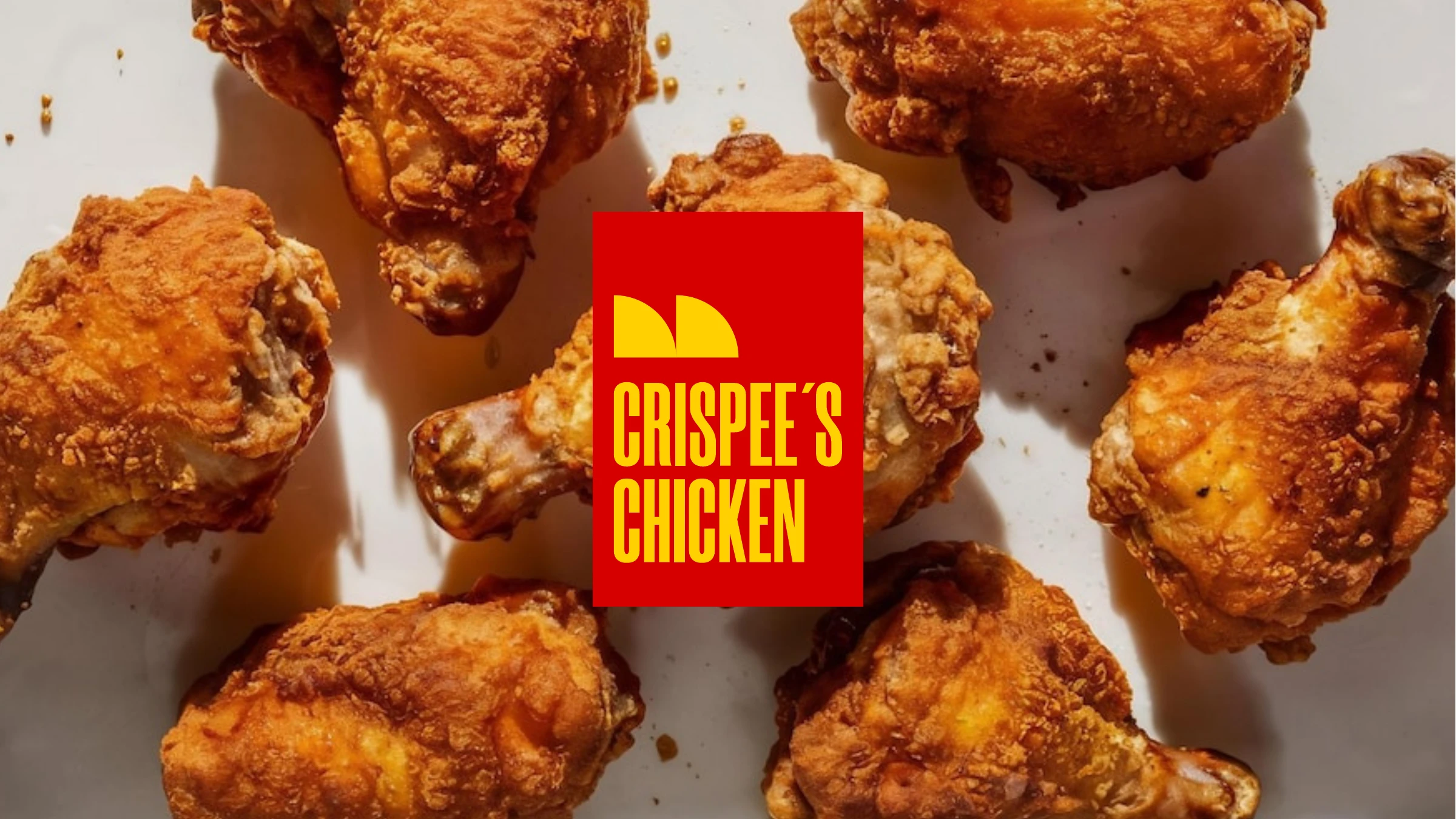 Fried chicken with the Crispee's Chicken logo