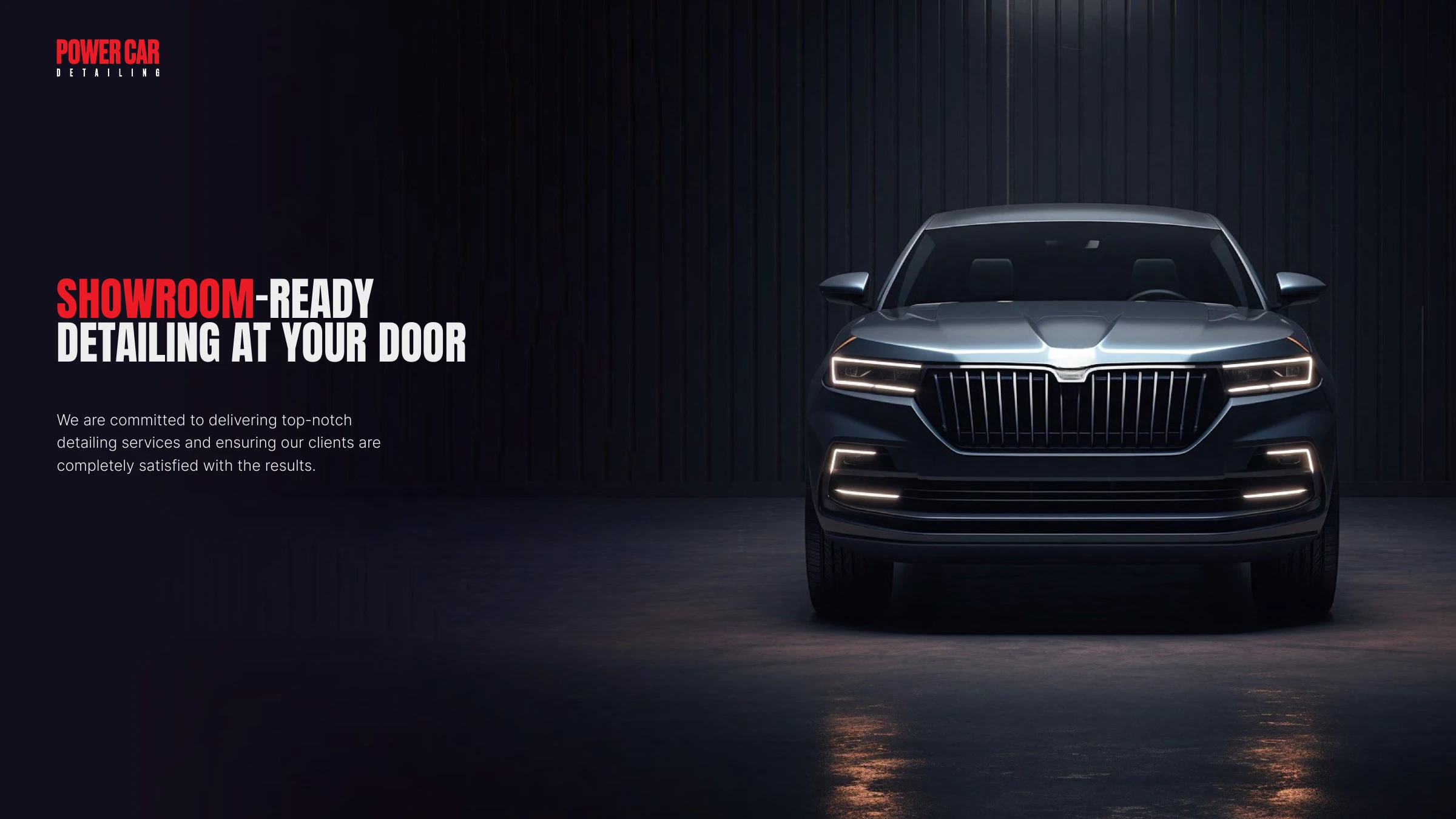 Showroom-ready dark sedan hero — top-notch detailing in the red system