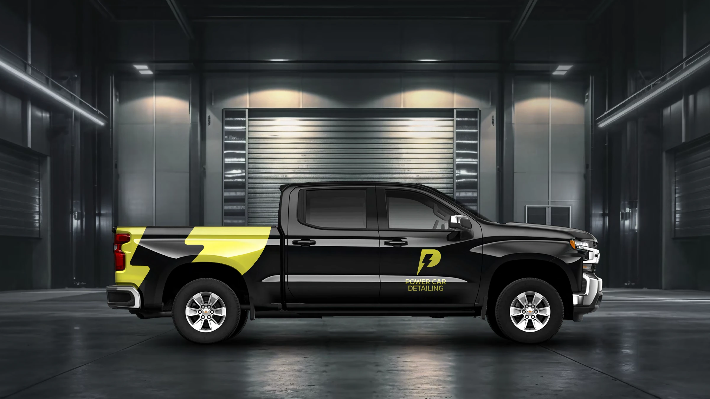 Black Chevrolet Silverado wrap with the yellow lightning-bolt Power Car Detailing graphic