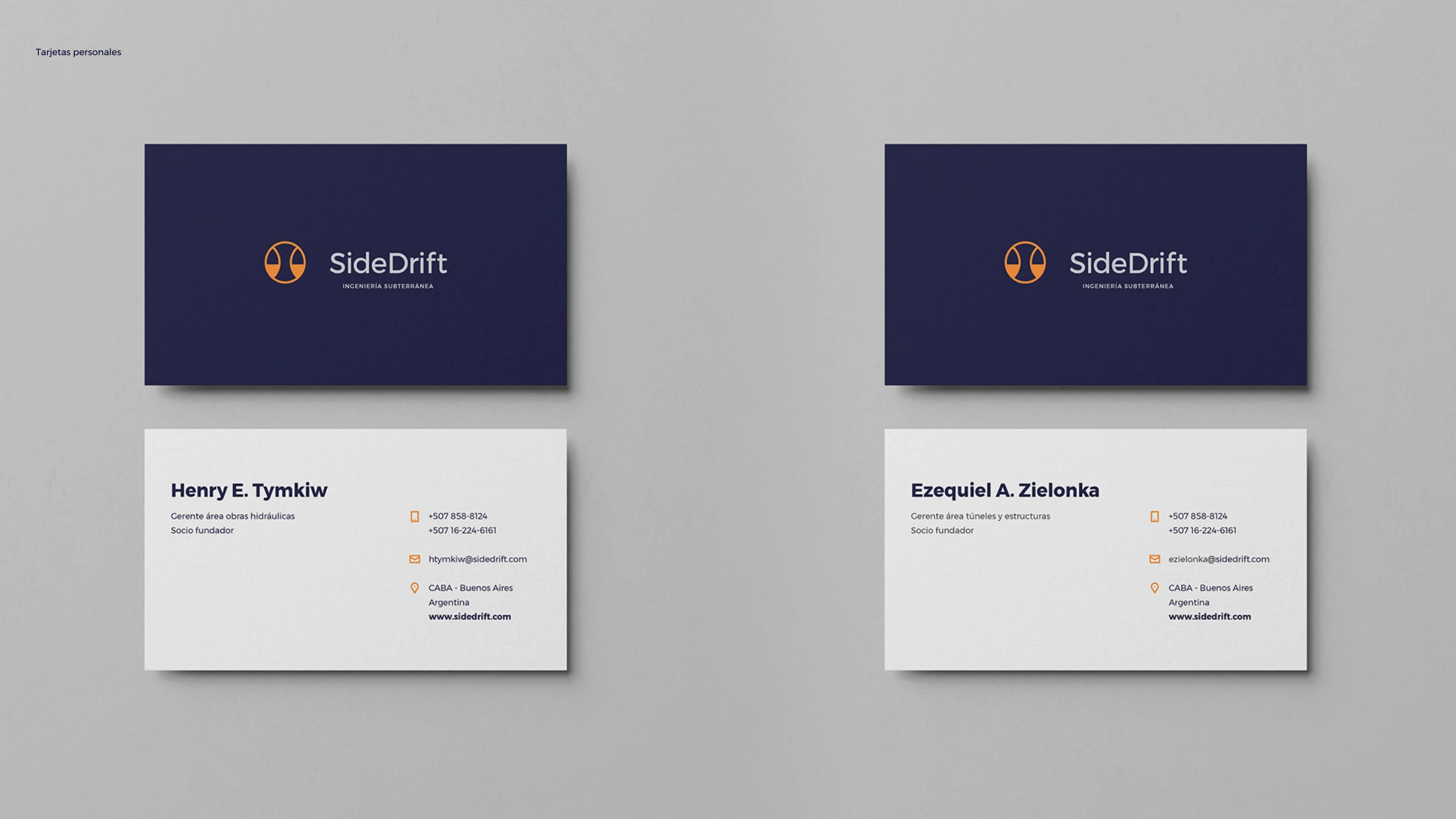 SideDrift business cards — navy front with the logo, light back with contact details