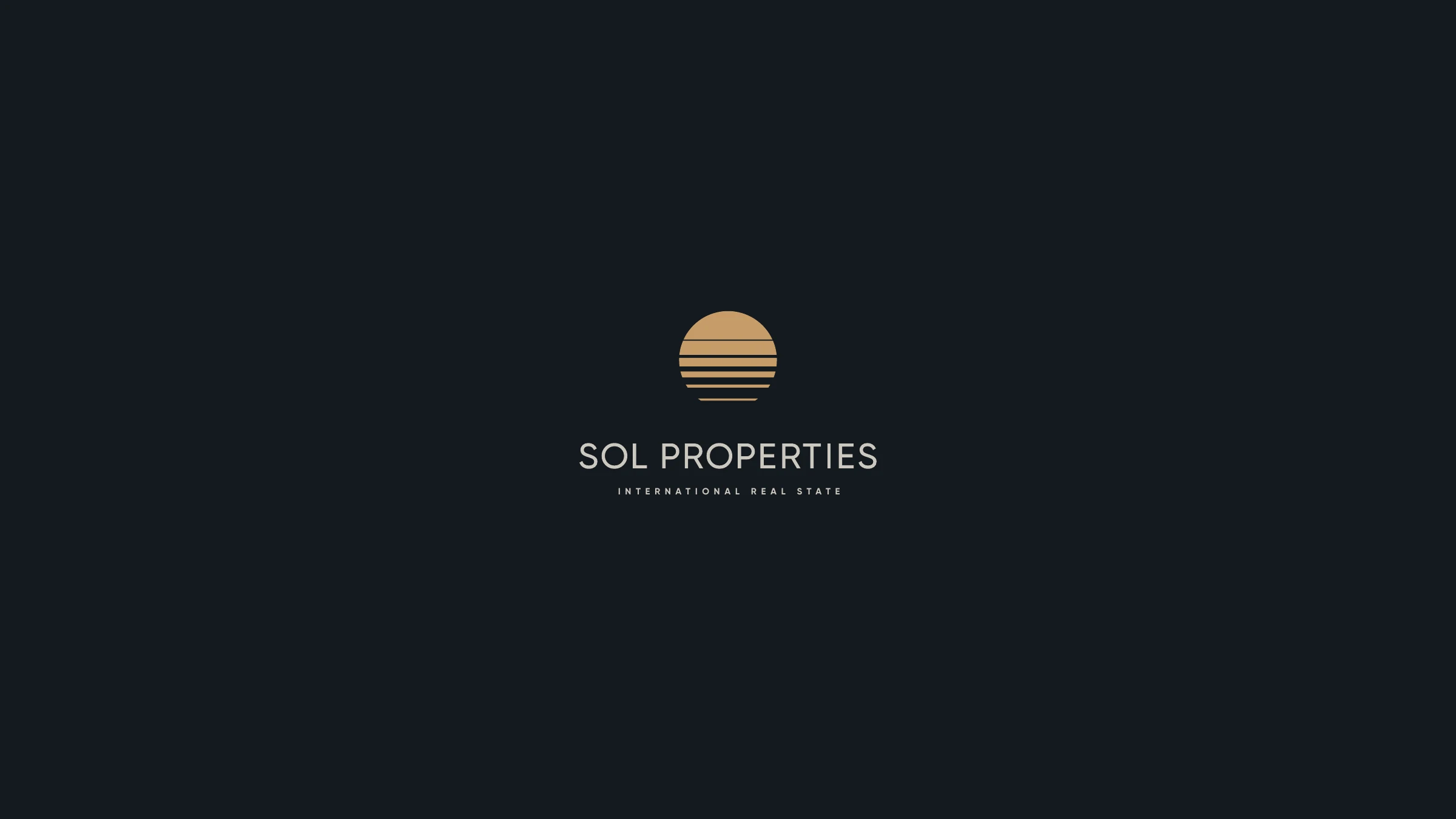 The chosen Sol Properties logo — the gold retro-sunset mark above the wordmark and 'International Real Estate', on deep navy