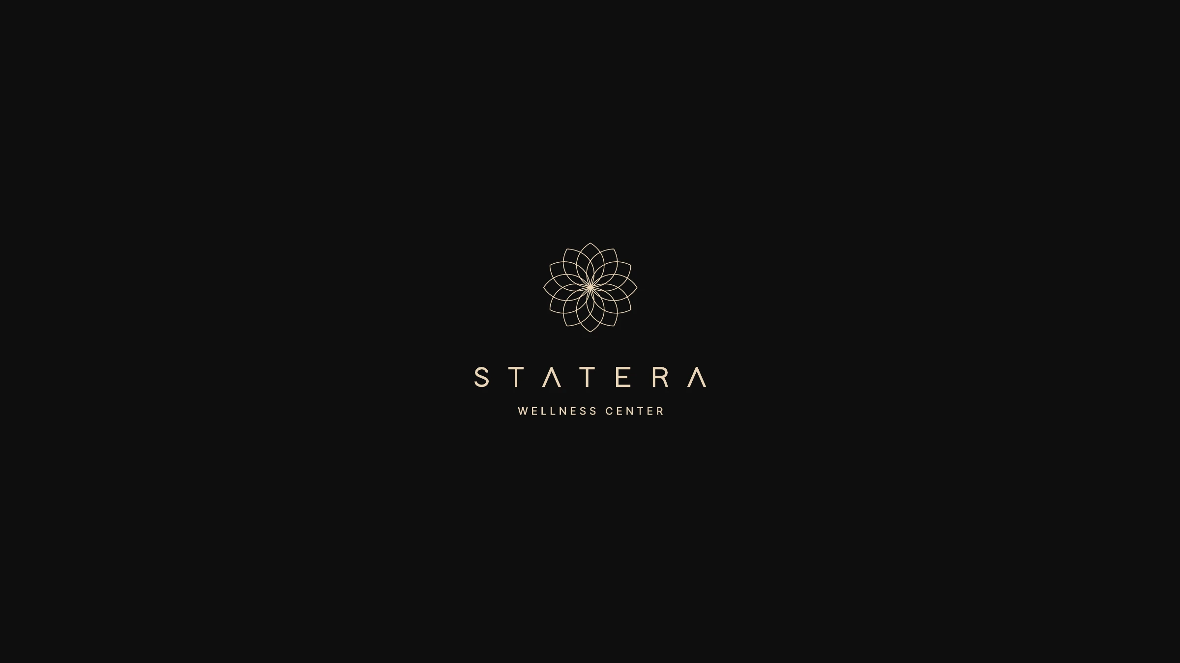 The Statera Wellness Center logo — a gold lotus-mandala mark above the STATERA wordmark, on black