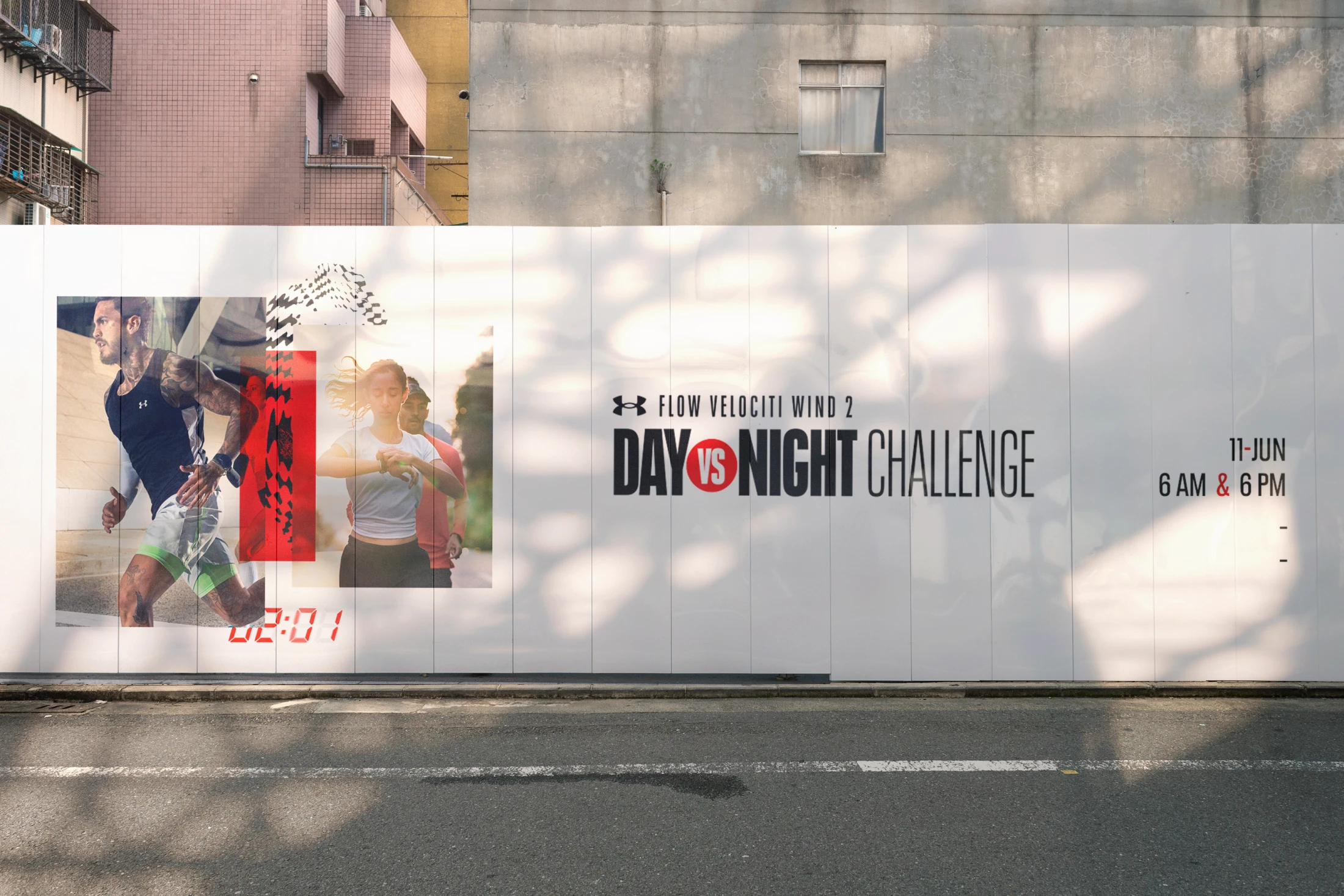 Street hoarding, day version — the Day vs Night Challenge key visual with checkered flag and 02:01 countdown