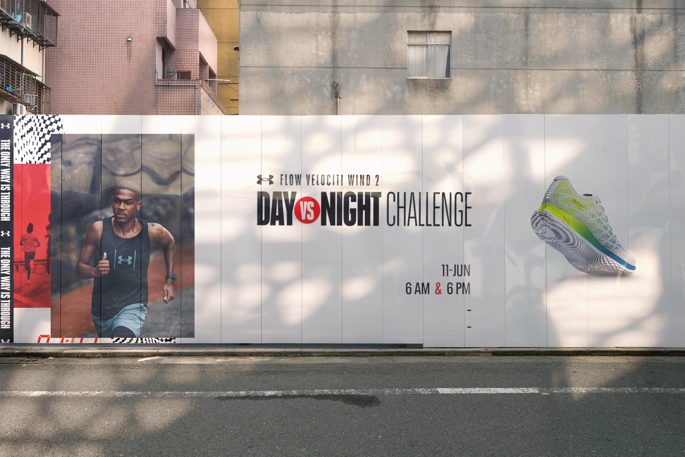 Street hoarding, night version — a night runner alongside the floating Flow Velociti Wind 2 shoe
