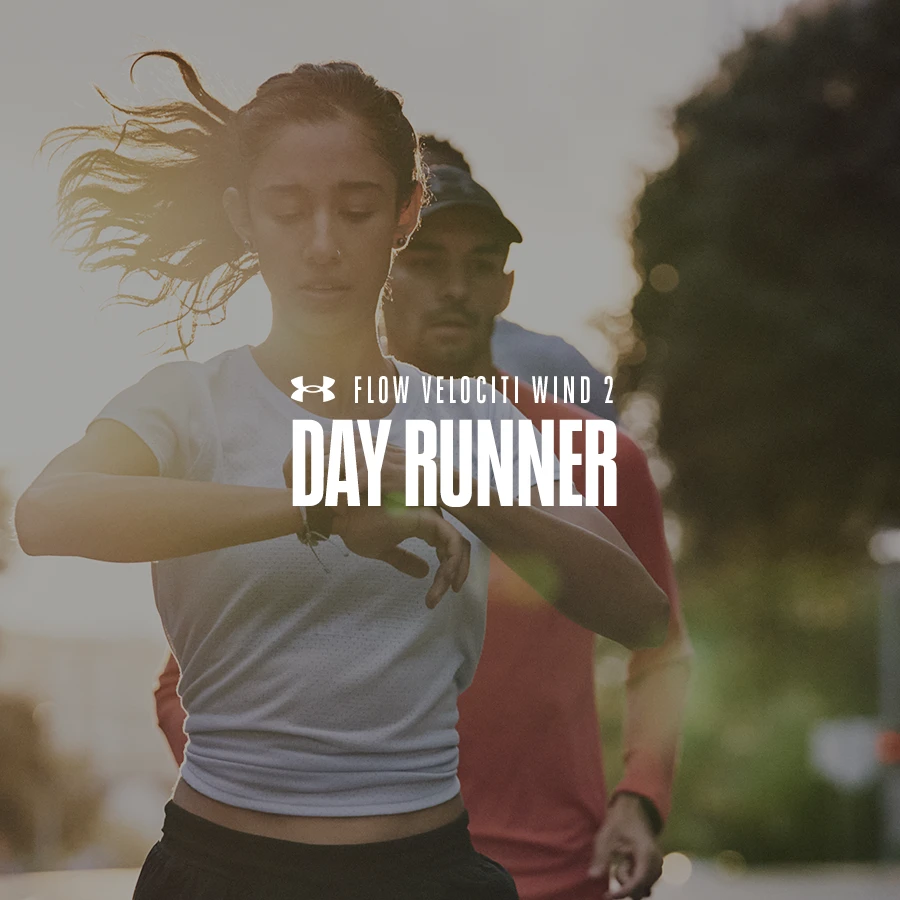 Day Runner tile — a runner checking her watch in morning light